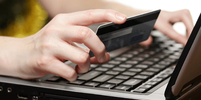 Person depositing online with credit card.